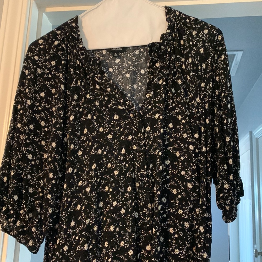 Woman’s black blouse